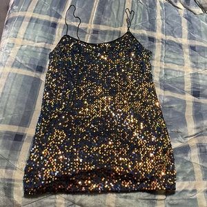 Gently Worn Sequin Stylish Top Can be worn as a short mini dress 👗 as well